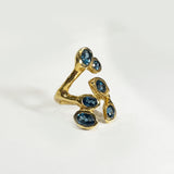 Embracing Branch with Blue Topaz Leaves
