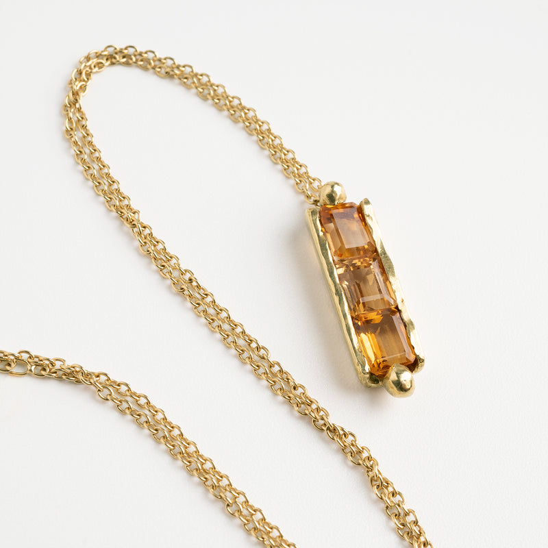 Aligned three citrines gold necklace