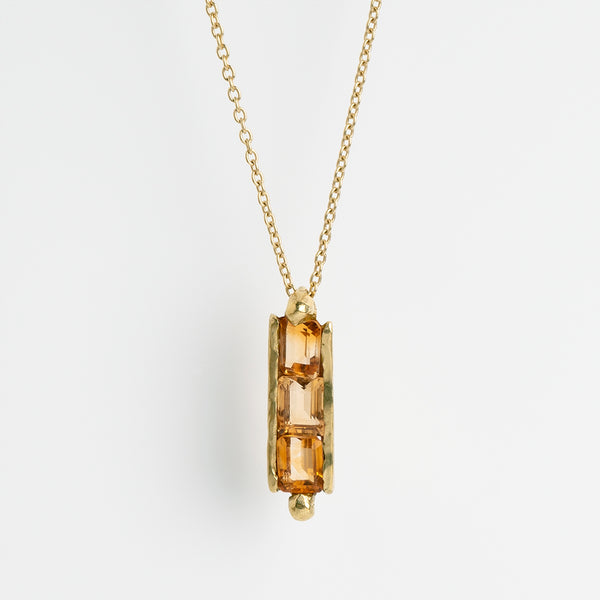 Aligned three citrines gold necklace