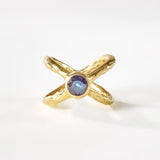 Crossed paths sapphire gold ring
