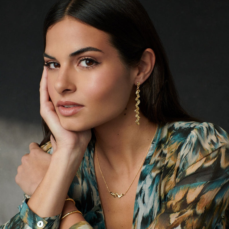 Rising leaves gold earrings