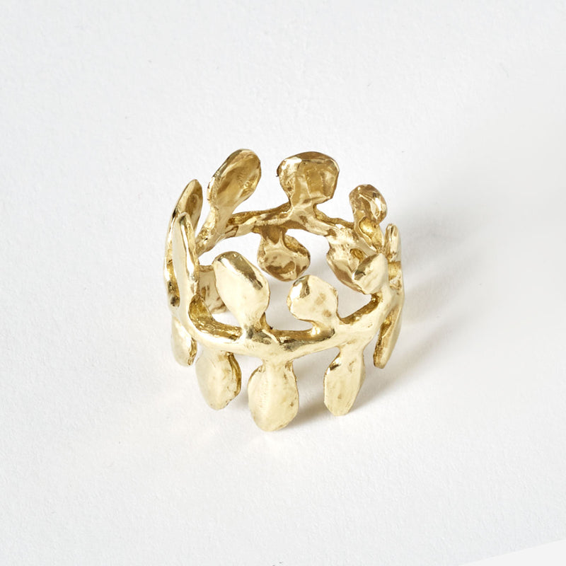 Surrounding branch gold ring