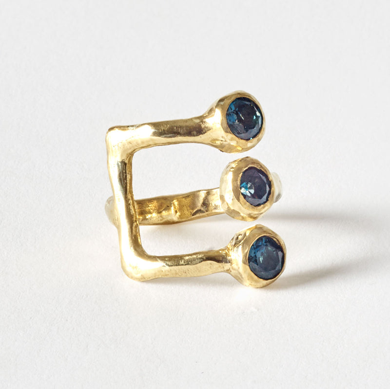 The three rocks London blue topaz gold ring