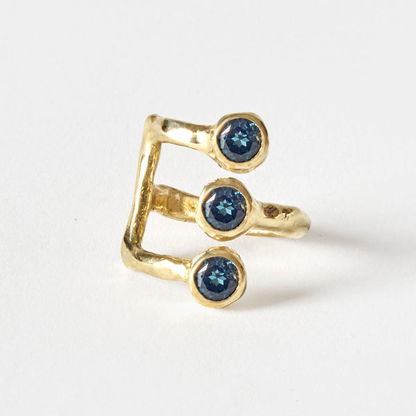 The three rocks London blue topaz gold ring