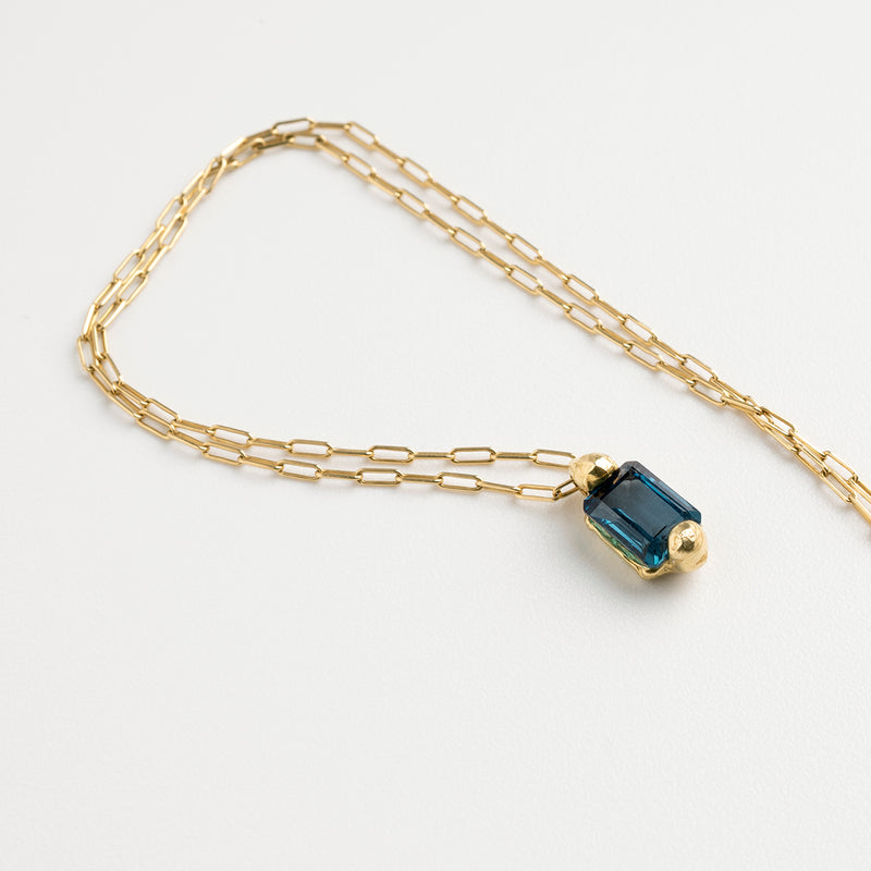 Bond rectangular blue topaz gold necklace
